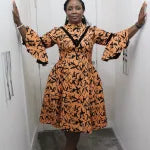 Aduke - Flattering midi contrast dress with funnel sleeves